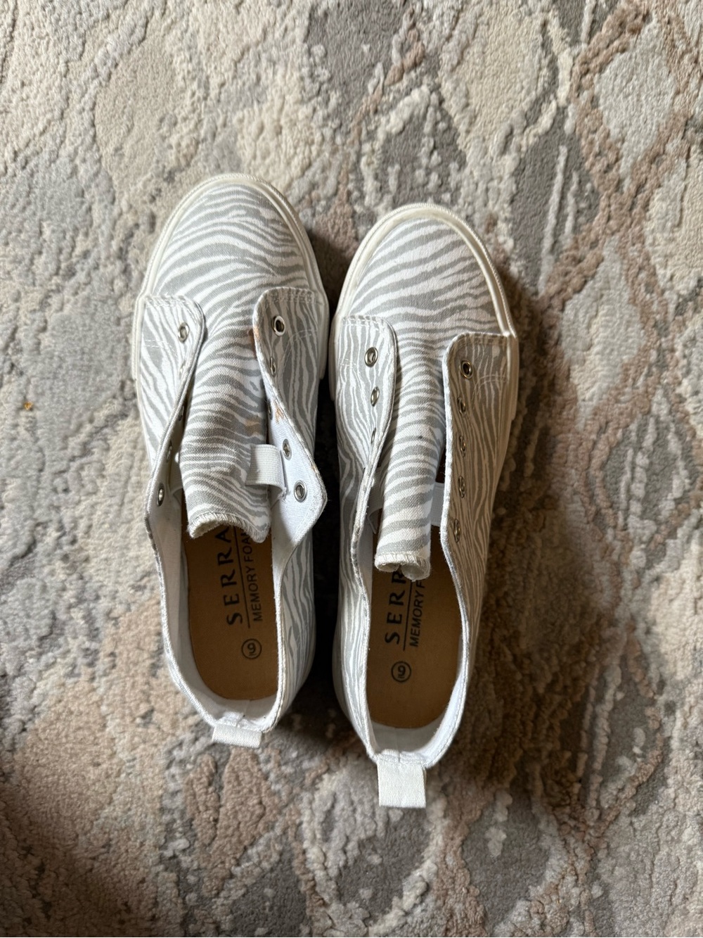 Serra Slip-On Zebra Print Sneakers in Beige & White